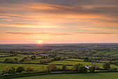 Sunset over beautiful rolling Devon countryside in summer, Devon, England, United Kingdom, Europe