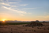 Sunset over the rocky landscape of Damaraland near Twfelfontein, Namibia, Africa