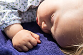 Girl (1 year) sleeping, Marielyst, Falster, Denmark