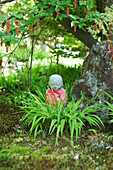 Statuette in ornamental garden