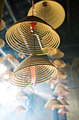 Incense burning in Chinese temple, low angle view, close-up