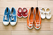 Family's shoes lined up together