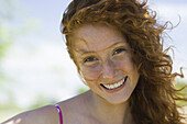 Young woman smiling, portrait