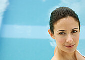 Woman's face, pool in background