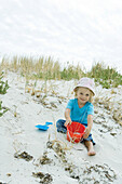 Child playing in sand