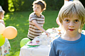 Boy at outdoor party, portrait