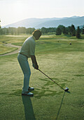 Golfer preparing to swing