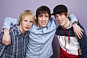 Three teenage boys, portrait, studio shot