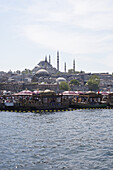 Tour boats on the Golden Horn River below the Suleymaniye Mosque, Istanbul, Turkey
