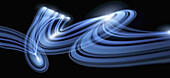 Light trails creating an abstract blue swirling pattern on a black background