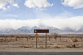 Arrow Sign On Highway at Californian Sierra Nevada