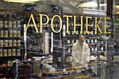 Shop window of German pharmacy (Apotheke)  in Schwabisch Hall, Baden-Württemberg, Germany