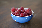 Close-up of raspberries in bowl on table