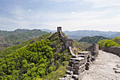 Great wall of China and mountain range in background