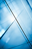Abstract intersecting lines on a glass surface