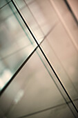 Abstract intersecting lines on a glass surface
