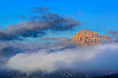 Hohe Gaisl emerging out of clouds, alpine hut Auronzo-Huette, Drei Zinnen, Tre Cime di Lavaredo, UNESCO World Heritage Site Dolomites, Dolomites, Veneto, Italy