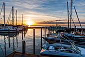 Boats in marina at sunrise, Munkmarsch, Sylt, Schleswig-Holstein, Germany