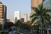 Shopping district buildings in Makati City, the financial district in the center oft he capital Metro Manila, Phillipines, Asia
