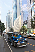 Jeepney typical phillipine public transport, Ayala Avenue in Makati City, the financial and business district in the center oft he capital Metro Manila, Phillipines, Asia