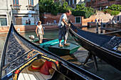 Lorenzo della Toffola, traditional gondola boat builder, dry dock, maintenance, black lacquer, decoration, Venice, Veneto, Italy