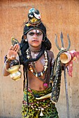 India, Rajasthan, Pushkar, Young sadhu dressed as God Shiva.