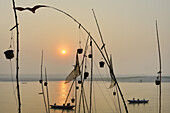 India, Uttar Pradesh, Varanasi, Sunrise on the Ganges.