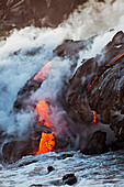 Hawaii, Big Island, Kalapana, Pahoehoe Lava Flowing From Kilauea Reaching The Pacific Ocean.