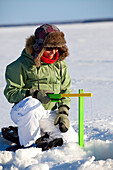Woman Ice Fishing, Preissac Lake, Abitibi-Temiscamingue, Quebec