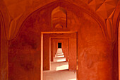 Corridor of sandstone in buildings beside the Taj Mahal, Agra, India.