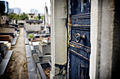'Old crypt door at Montmartre cemetery; Paris, France'