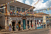'Colonial Portuguese buildings festooned with carnival decorations; Ouro Preto, Minais Gerais, Brazil'