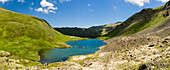 Composite panorama of Hanging Valley Tarn in South Fork Eagle River in Chugach State Park in Southcentral Alaska. Summer. Afternoon.