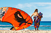 'Professional kiteboarder Niccolo Porcella kiteboarding on the north shore of Maui, Maui, Hawaii, United States of America'