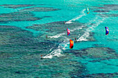 'Aerial view of kiteboarders riding across the crystal clear blue waters, Anegada Island, British Virgin Islands'