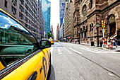 Yellow Cab on street in Manhattan, New York City, New York, United States of America.