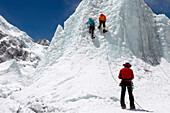 Mountaineers climbing up the Khumbu Icefall on the route up Everest.