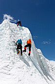Mountaineers climbing up the Khumbu Icefall on the route up Everest.