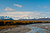 Southside View Of Mt. Mckinley And Mt. Hunter (L) With The Chulitna River In The Foreground On A Sunny Day, Denali State Park, Southcentral Alaska, Fall
