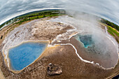 View of hot springs in the Haukadalur valley on the slopes of Laugarfjall hill, Iceland, Polar Regions