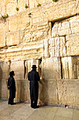 Worshippers at The Western Wall, UNESCO World Heritage Site, Jerusalem, Israel, Middle East