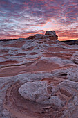 Red clouds over sandstone at sunrise, White Pocket, Vermilion Cliffs National Monument, Arizona, United States of America, North America