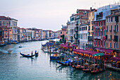 A gondola crossing the Grand Canal, Venice, UNESCO World Heritage Site, Veneto, Italy, Europe