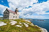 Stone lighthouse in Rose Blanche, remote village in southern Newfoundland, Canada, North America