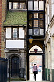 Tudor gateway to St. Bartholomew church, a timbered house from the time of Elizabeth I, West Smithfield, London, England, United Kingdom, Europe