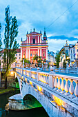 Franciscan Church of the Annunciation and bridge over the Ljubljanica River, Ljubljana, Slovenia, Europe