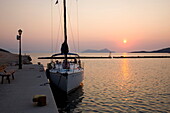 View across the harbour at sunrise, Frikes, Ithaca (Ithaki), Ionian Islands, Greece