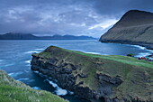 Dramatic coastline beside the village of Gjogv on the Island of Eysturoy, Faroe Islands, Europe