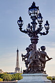 Statues on Pont Alexandre III with the Eiffel Tower in the background, Paris, France, Europe