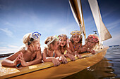 Girls in a sailing boat on lake Starnberg, Upper Bavaria, Bavaria, Germany